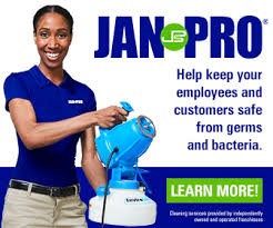 Woman holding cleaning equipment with Jan Pro logo